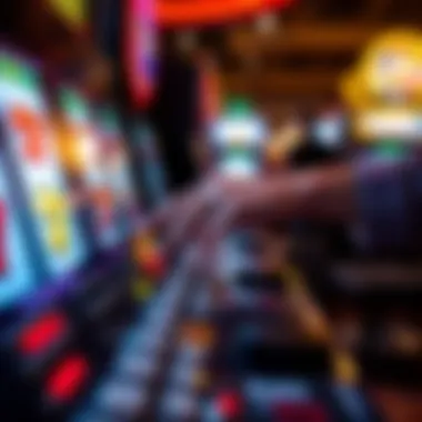 Close-up of a player's hand on a slot machine button